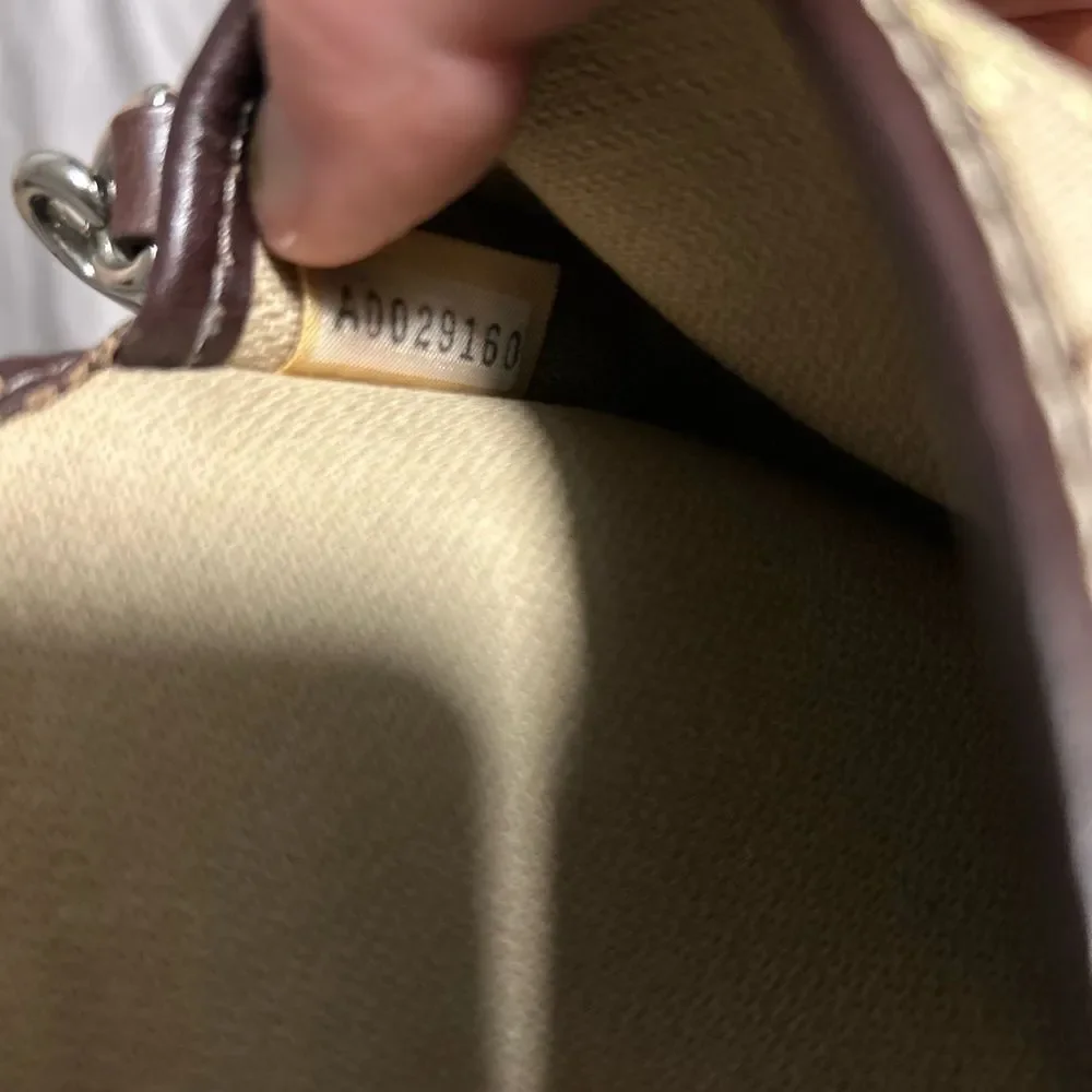 Dooney & Bourke Tan Canvas with Leather Trim Wristlet
